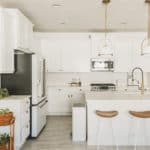 All-white kitchen design with white cabinets and white appliances | GE Cafe appliances