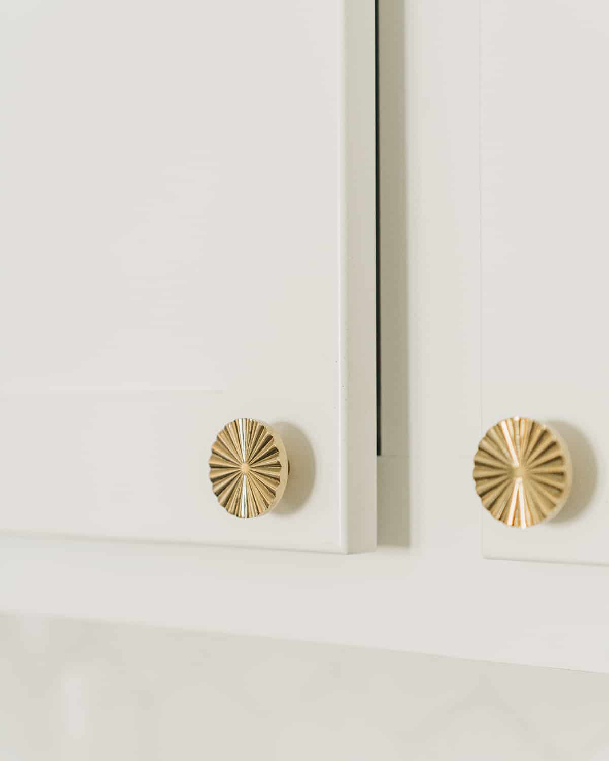 Gold pulls for white kitchen