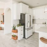 All-white kitchen design with white cabinets and white appliances | GE Cafe appliances