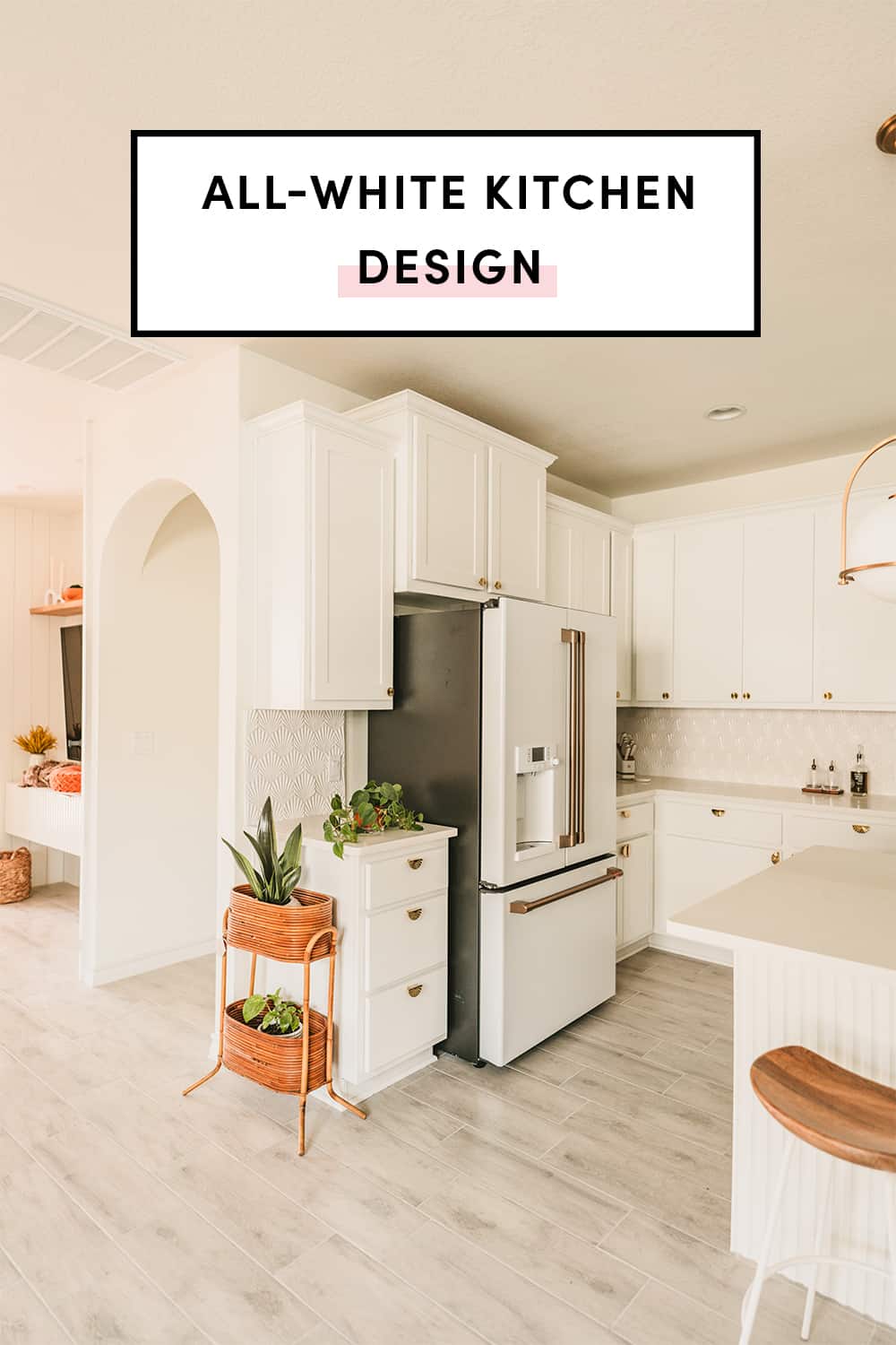All-white kitchen design with white cabinets and white appliances