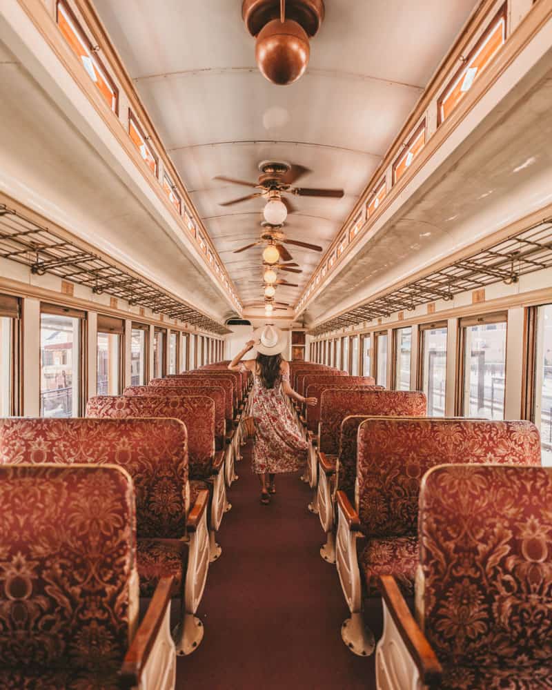 woman inside a train in Grapevine Vintage Railroad in Texas